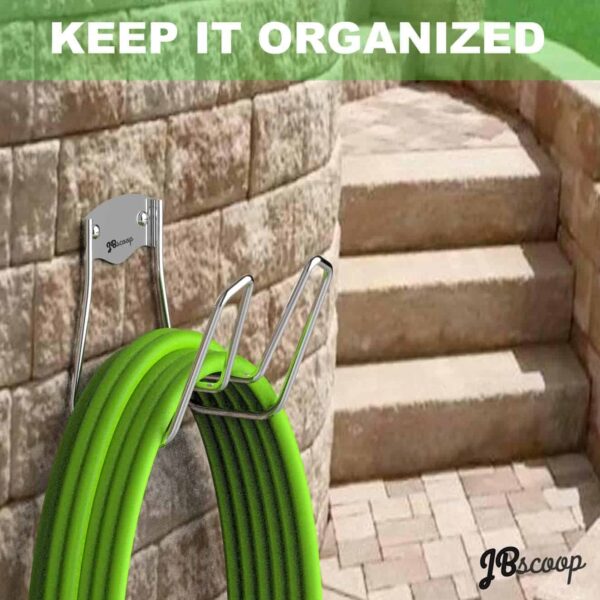 Wall mount hose hanger mounted on a wall for outdoor use